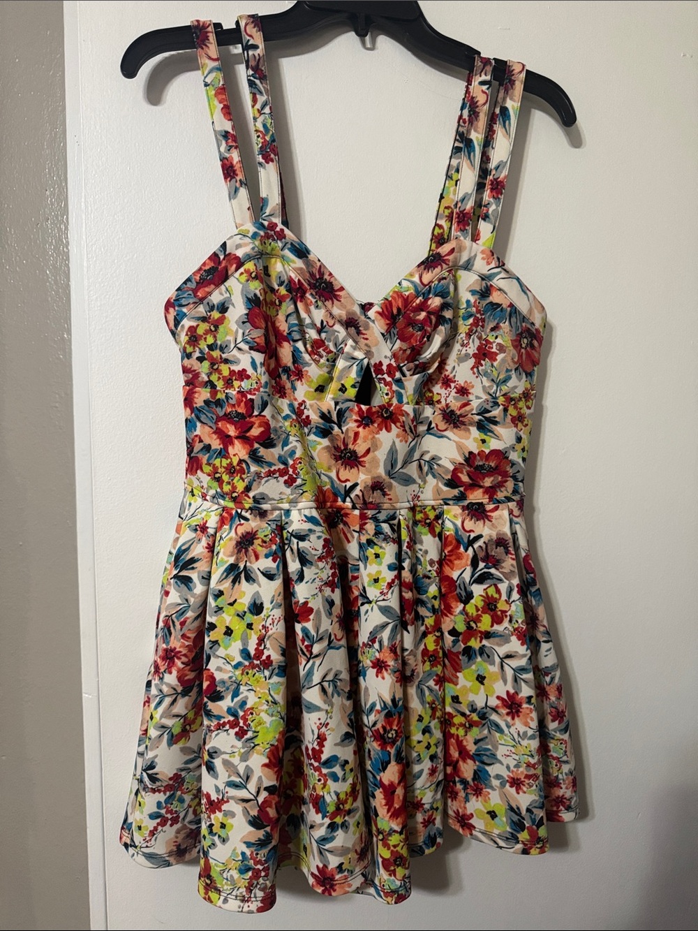 Material Girl Cream Floral romper with Red & Blue Accents